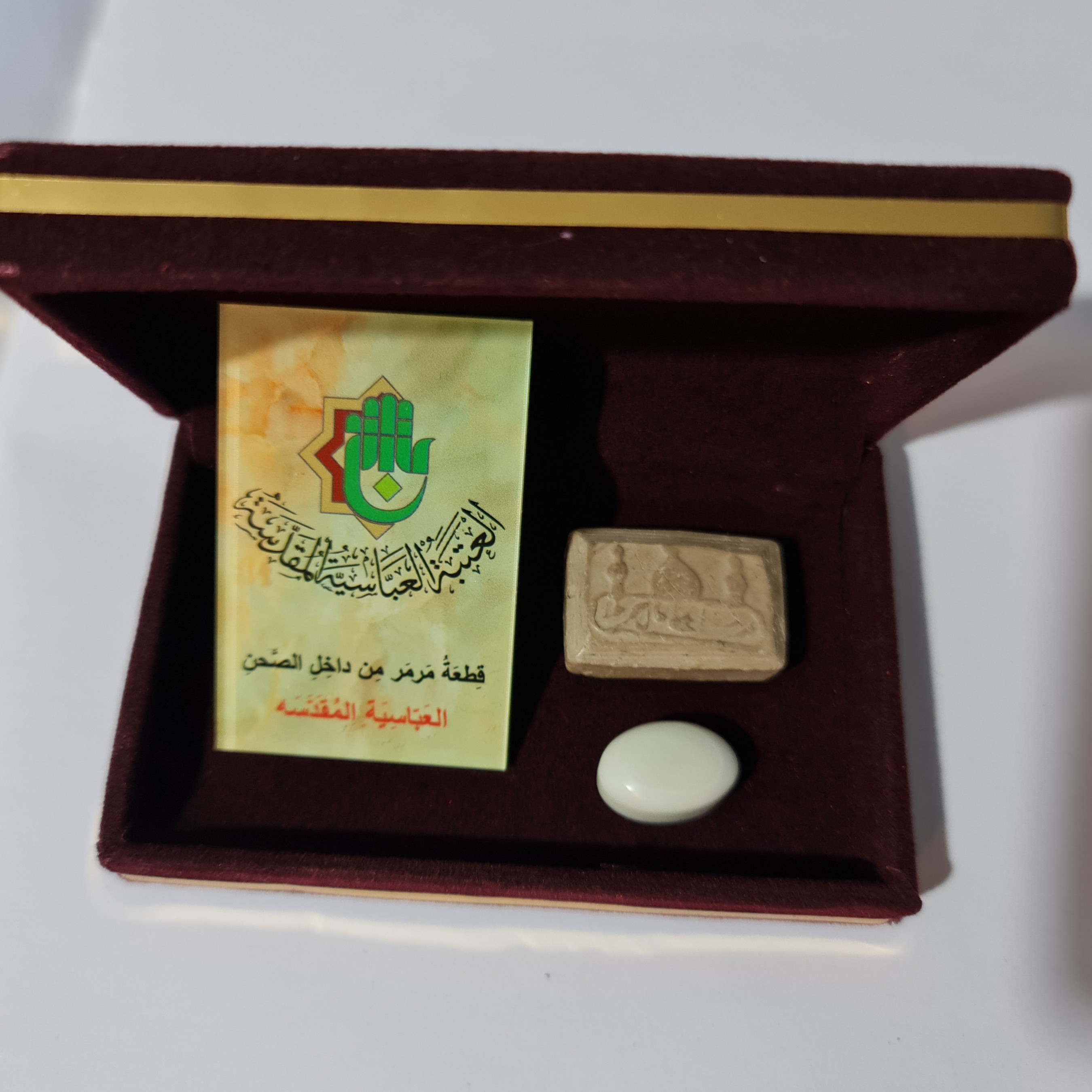 نگین انگشتر سنگ حرم حضرت عباس همراه با فاکتور اصالت کالا از عتبه( همراه هدیه مهر حرم امام حسین کربلا